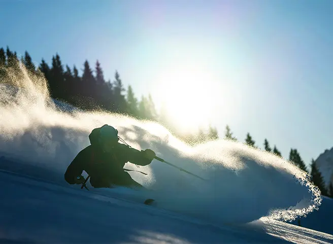 Man skiing down mountain